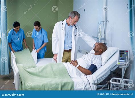 Doctor Interacting With Patient In Ward Stock Photo Image Of Black