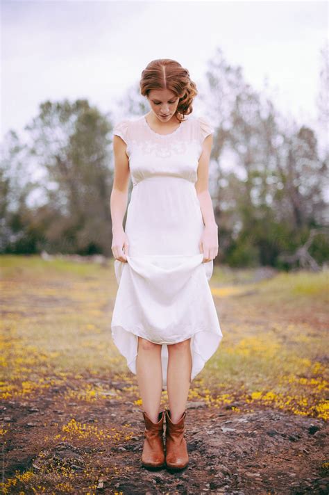 Woman With Red Hair Wearing A White Dress Del Colaborador De Stocksy Briana Morrison Stocksy