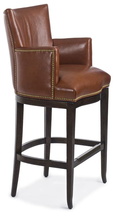 A stool is one of the earliest forms of seat furniture. Chocolate leather swivel bar stool