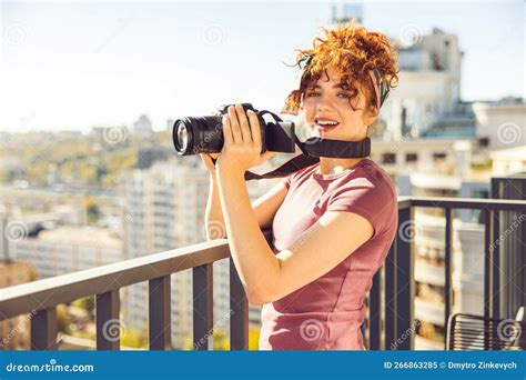 Ginger Young Woman Making Photos From The Balcony Stock Image Image