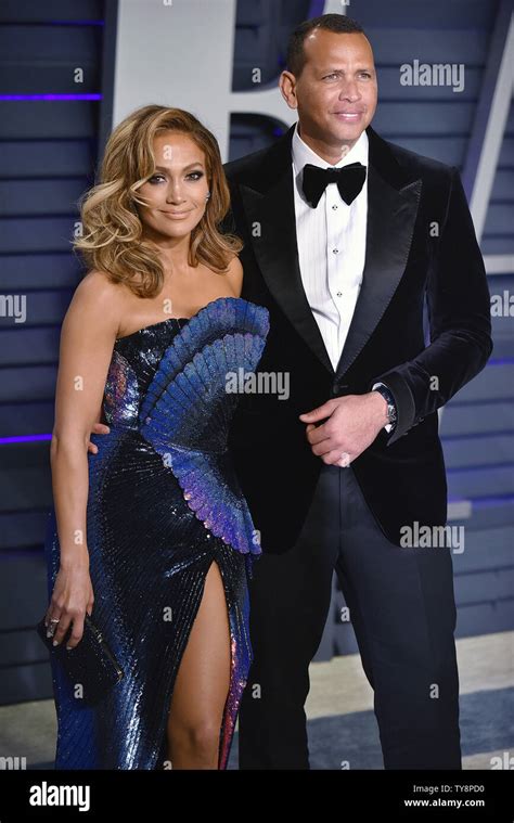 Jennifer Lopez L And Alex Rodriguez Arrive For The Vanity Fair Oscar