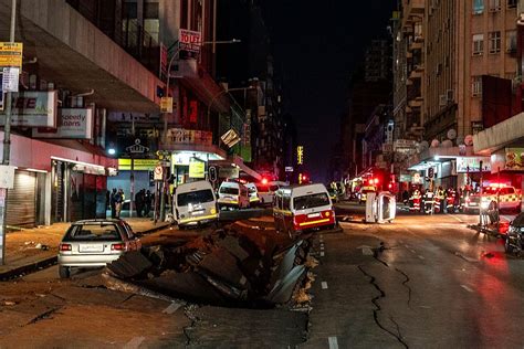 Suspected Gas Explosion In Johannesburg Rips Open Roads And Flips Cars