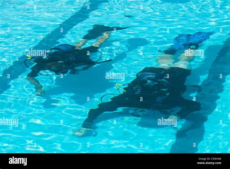 Tourists Learning To Dive In A Swimming Pool At A Holiday Village In Skala Eresou On Lesbos