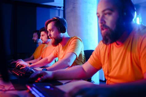 Male Esports Team Competing In An Esports Tournament At An Esports