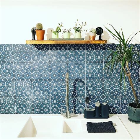 In this modern marvel of a kitchen the blend of luxe materials helps to add depth and interest. In love with this image of our navy Octagon tiles, used ...