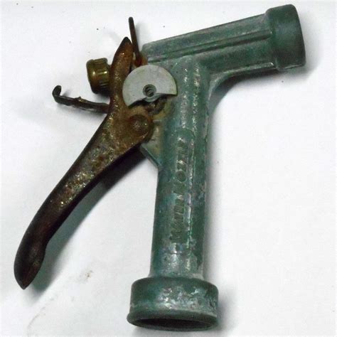 Imagine holding the water nozzle, what 7 spray patterns, that's all you need. Vintage metal brass Water Pistol Nozzle Garden hose ...