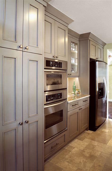 Greige is a little bit gray, a little bit beige — and a whole lotta flexible. Tuscan Revival | ShowplaceEVO | Showplace Cabinetry