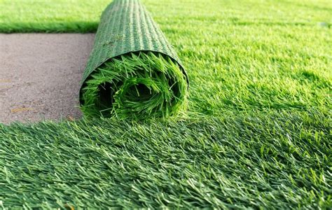Lay out the synthetic grass rolls. How To Lay Artificial Grass on Concrete - Oxcrete