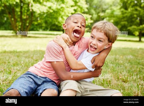 Two Children Fight And Fight Together In Kindergarten Stock Photo Alamy