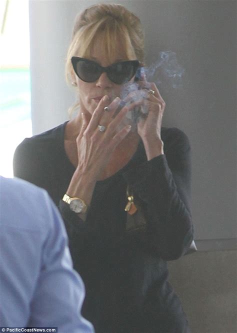 Melanie Griffith Just Cant Kick Her Dirty Habit As She Sneaks In A