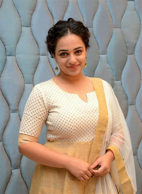 nithya menon bold and hot hd quality images and wall papers celebrity images