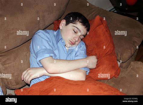 12 Year Old Boy Napping Stock Photo Alamy