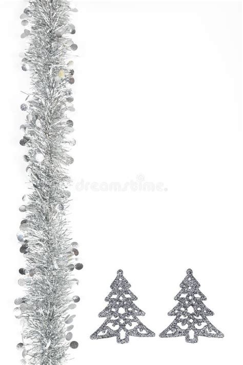 Christmas Silver Garland And Silver Trees Decoration On White