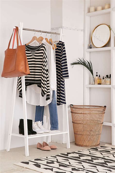 Instead of throwing your jacket on the back of a chair or piling your clothes on top of your bed, a garment rack will organize your closet and help keep your living space tidy. Wooden Clothing Rack | Furniture for small spaces, Wood ...