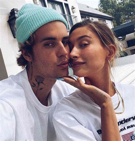 Justin Bieber And Hailey Baldwin Pose In Bed Together On The Cover Of