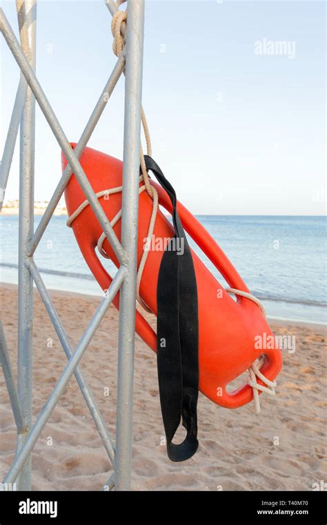 Beach Life Saving Lifeguard Tower With Orange Buoy On The Beach