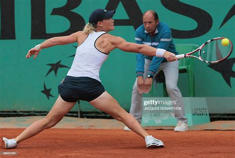 Australian Samantha Stosur Hits A Return To Belgian Player Yanina