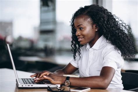 Download African American Business Woman Working On Computer For Free