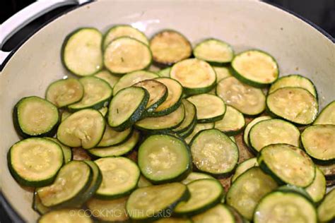 Sautéed Zucchini And Tomatoes Cooking With Curls