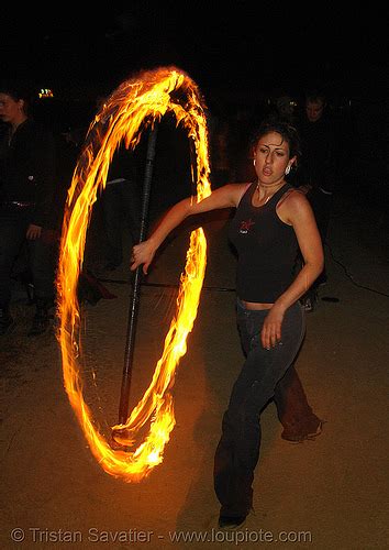 Lexie Spinning A Fire Staff