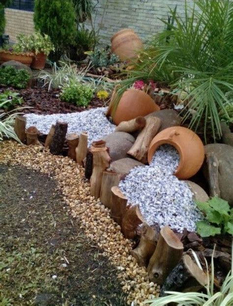 Discover new landscape designs and ideas to boost your home's curb appeal. Clay pots, decorative stone and flowers - 28 ideas for the ...