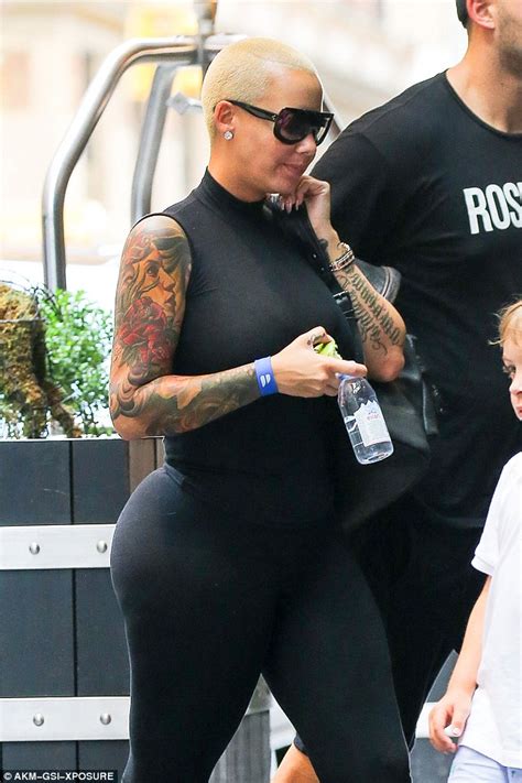 Amber Rose Flaunts Her Famous Bleached Blonde Buzz In New York Daily