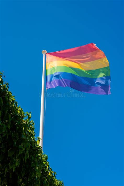 Lgbt Pride Flag Waving In The Blue Sky Stock Image Image Of Rainbow