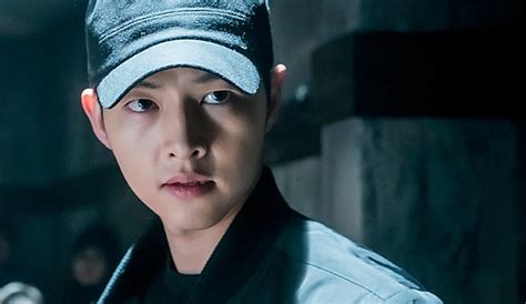 “descendants of the sun” song joong ki is a man in black and on a mission couch kimchi