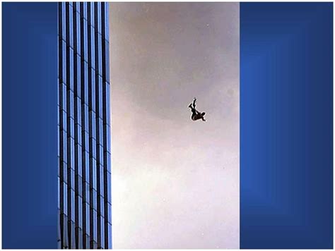 Two People Holding Hands As They Fall From The Twin Towers