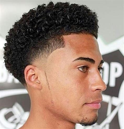 Youthful 21 Taper Fade With Curls Hairstyles For Men New Natural