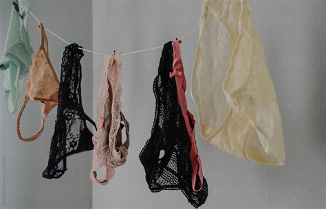 Line Of Panties And Underwear Hanging From Indoor Clothes Line By