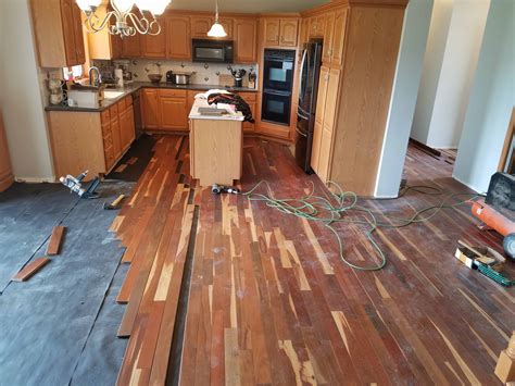 We installed floor tiles thru our kitchen, bath, hallway 2 yrs ago; Residential Hardwood Flooring Installation in Wichita KS ...