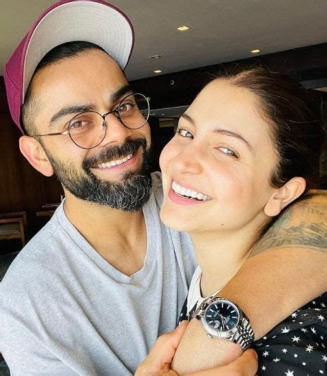The Couple Can Be Seen Smiling In The Picture With Kohli S Arm Wrapped