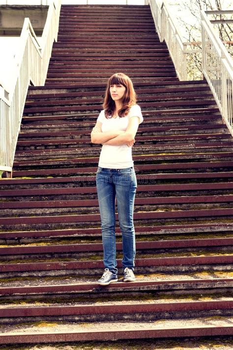 Beautiful Girl Standing At The Old Stairs Toned Image Stock Image