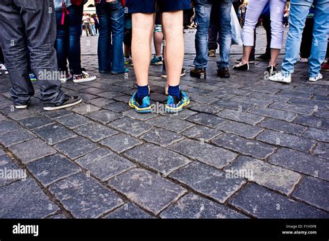 Crowd Of People Legs On A Street Paved With Setts Stock Photo Alamy