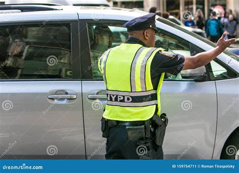 nypd officer directing traffic in manhattan editorial photo image of american city 159754711