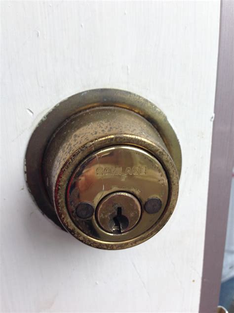 The key for the door has long been lost and sometimes someone will turn the internal lock and the door cannot be opened. doors - How do I remove this Schlage double-cylinder ...