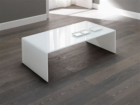 That's why many people choose a table that bears a unique and recognizable signature for the furniture of their living room or office. Nella Vetrina Tonelli Qubik Modern White Italian Glass Coffee Table