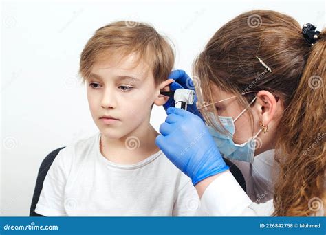 Diagnosis Of Impairment And Hearing Testing In Children Doctor Using