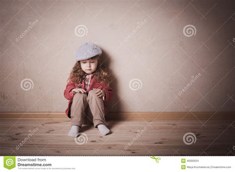 Sad Child Sitting On The Floor Stock Photo Image 46300554