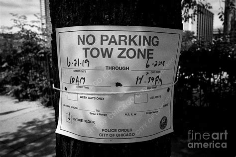 Chicago Police Temporary No Parking Tow Zone Notice Posted On A Tree In