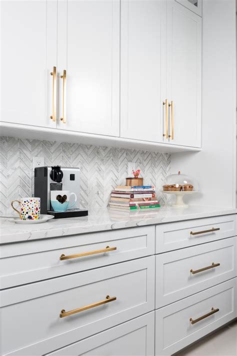 That's because no two pieces of natural stone are ever this space has a unique countertop paired with white cabinets. Stone Countertop, White Cabinets and Herringbone ...
