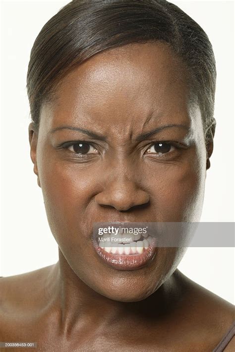 Young Woman Scowling Portrait Closeup High Res Stock Photo Getty Images