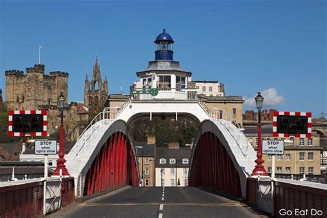 Newcastles Swing Bridge Castle And Cathedral Spire Seen On A Sunny