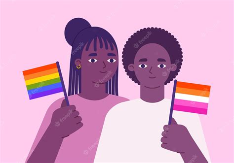 pareja de lesbianas negras celebración del mes del orgullo mujeres con banderas lgbtqi