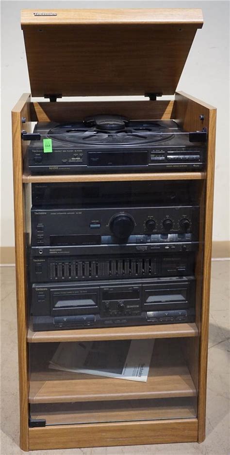 Lot Technics Four Piece Stereo Cabinet And A Pair Of Technics Floor