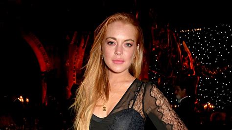 lindsay lohan posts topless photo while in costa rica stylecaster