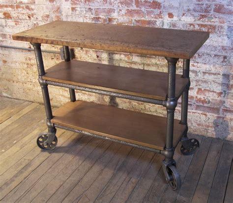 Maybe you would like to learn more about one of these? Vintage Industrial Wood and Metal Roll Around Cart ...