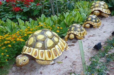 Stones can decorate your garden and they can also create edging for your garden bed. Three reasons to have statues in the garden. Flamingo ...