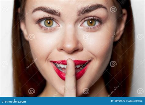 Close Up Portrait Of Woman Holding Finger Near Lips Stock Image Image Of Beauty Sign 196901573